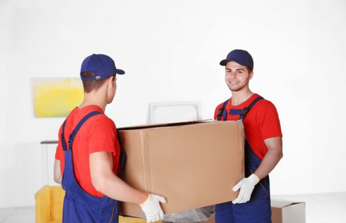 Friendly moving team assisting customers