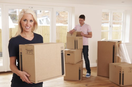 Packing professionals handling customer belongings