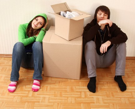 Professional movers handling furniture in a Beckenham property