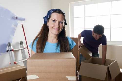 Commercial movers unloading business equipment at a new premises in Beckenham