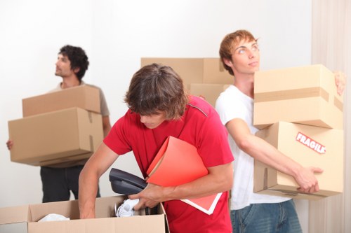 Office relocation equipment and furniture prepared for a commercial move
