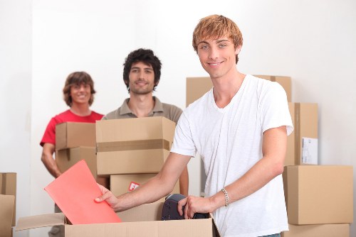 Happy customers with their moved belongings